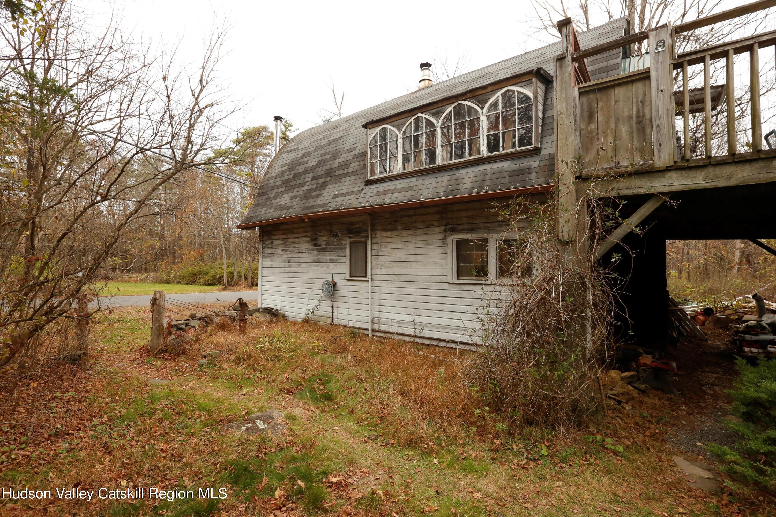424 High Falls Road Saugerties, NY 12477 - Photo 14 of 24 a view of a house with a patio