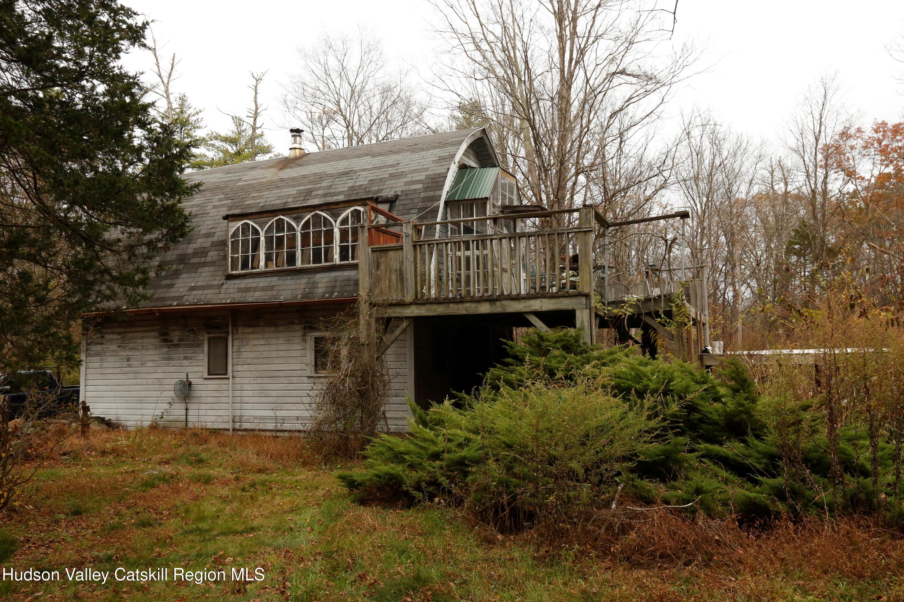 424 High Falls Road Saugerties, NY 12477 - Photo 2 of 24 a front view of a house with a yard