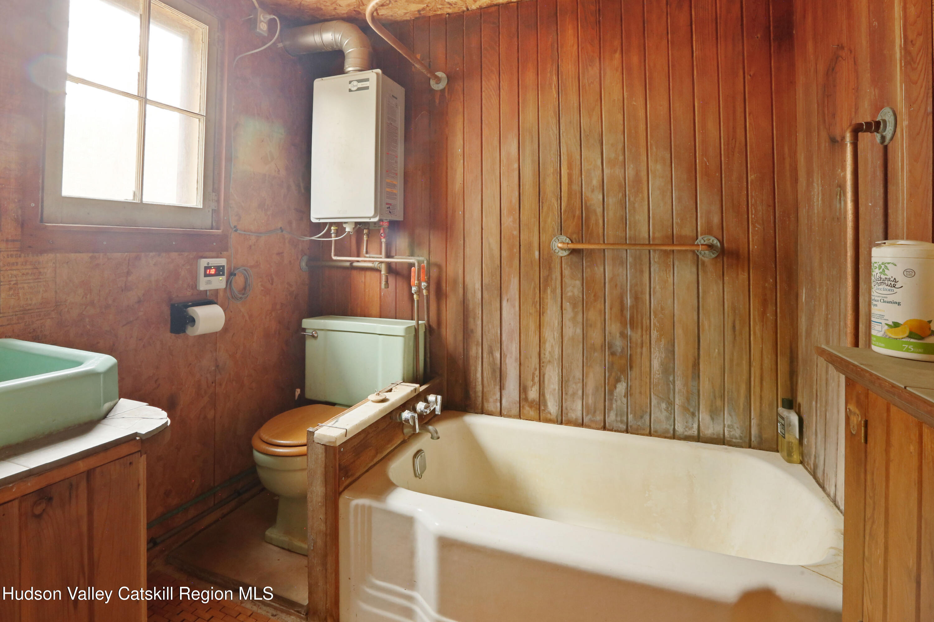 424 High Falls Road Saugerties, NY 12477 - Photo 10 of 24 a bathroom with a sink a toilet and tub