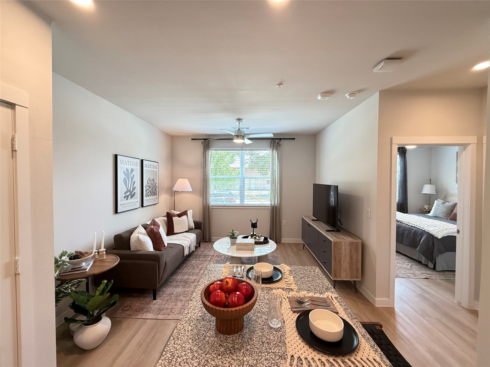 1610 Campbell Road, Unit 157 Houston, TX 77055 - Photo 5 of 11 a living room with furniture and a flat screen tv