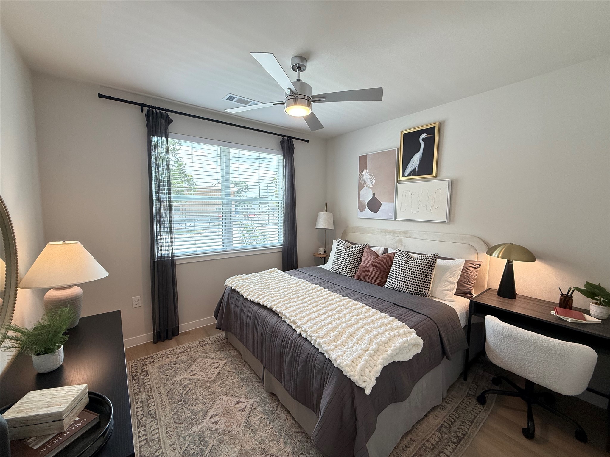 1610 Campbell Road, Unit 157 Houston, TX 77055 - Photo 7 of 11 a bedroom with a bed couch and window