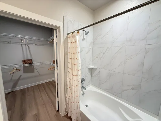 a bathroom with a sink and a shower