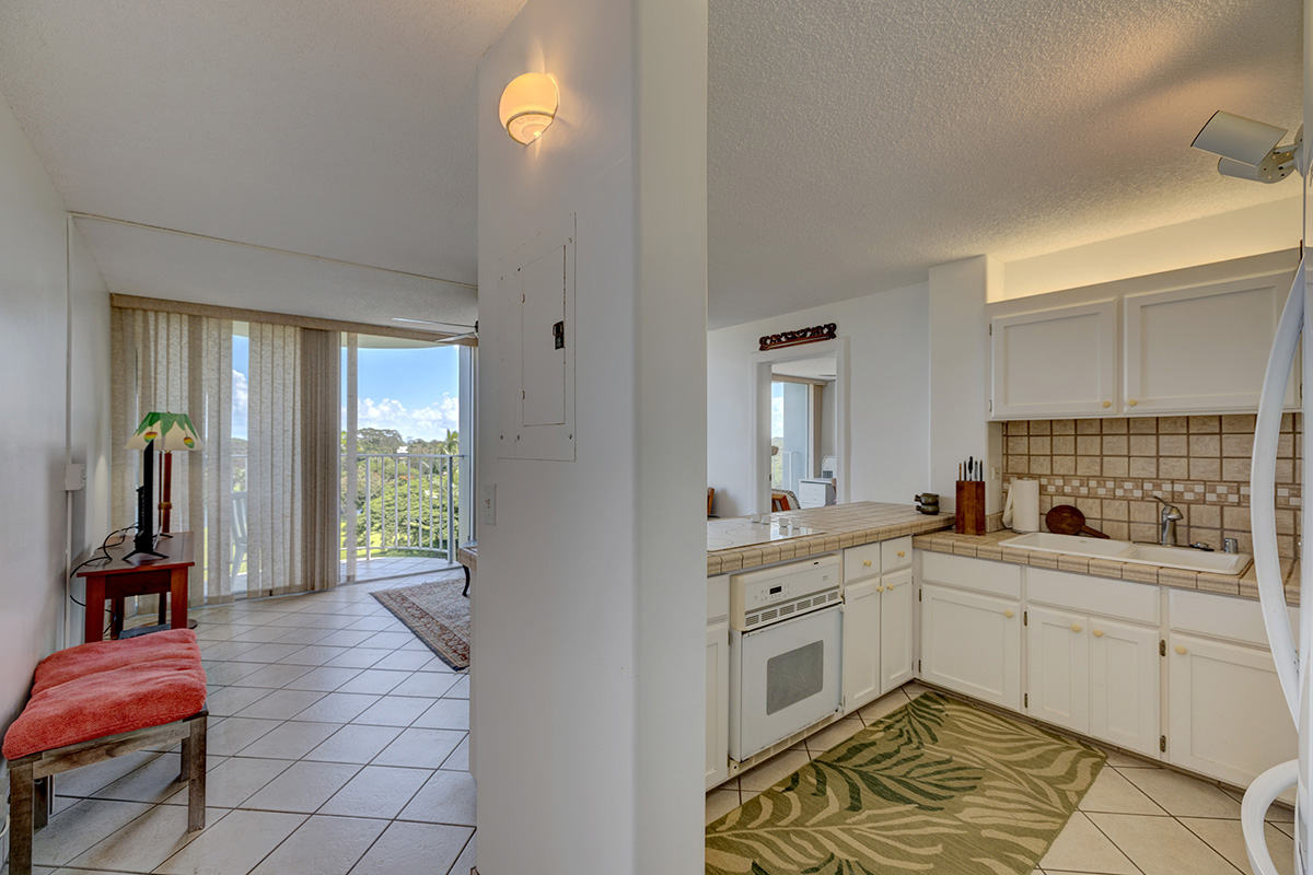 101 Aupuni Street, Unit 802 Hilo, HI 96720 - Photo 17 of 29 a kitchen with a sink and cabinets