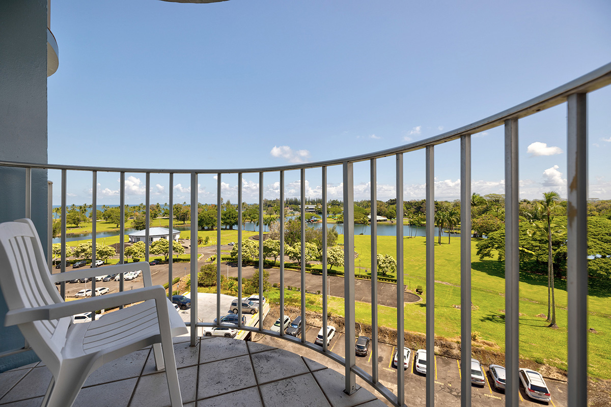 101 Aupuni Street, Unit 802 Hilo, HI 96720 - Photo 18 of 29 a view of a balcony with chairs