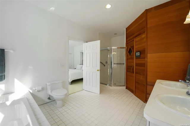 a bathroom with a sink and a large mirror