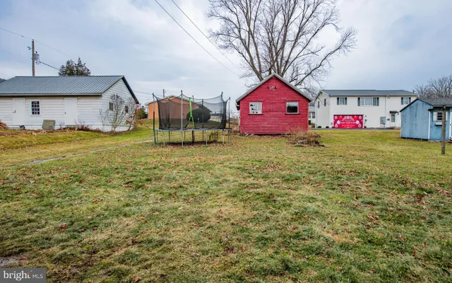 a front view of a house with a garage