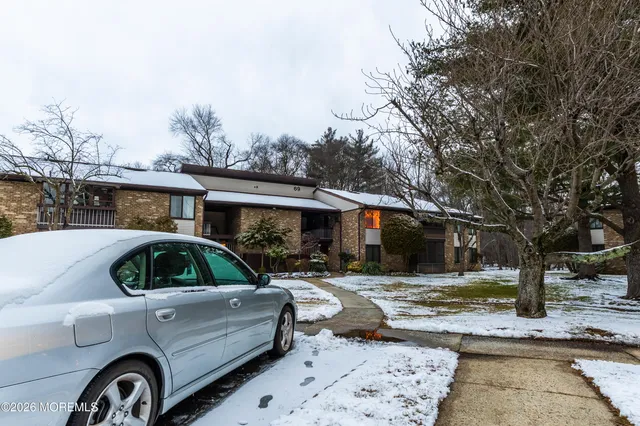 a front view of a house with parking yard