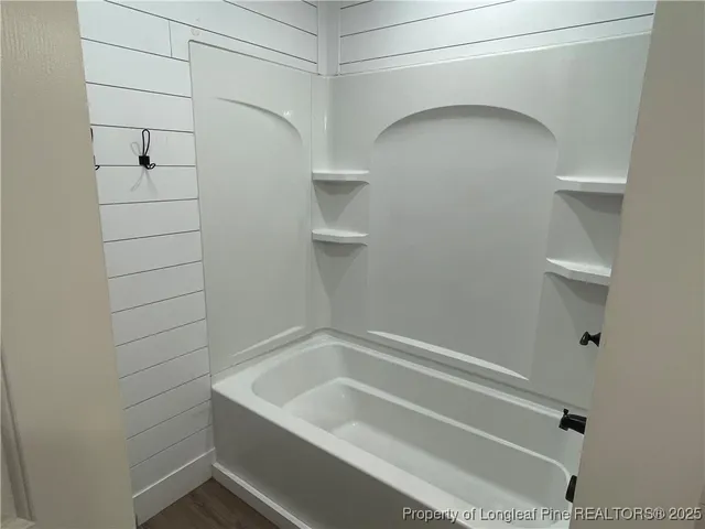 a bathroom with a bathtub