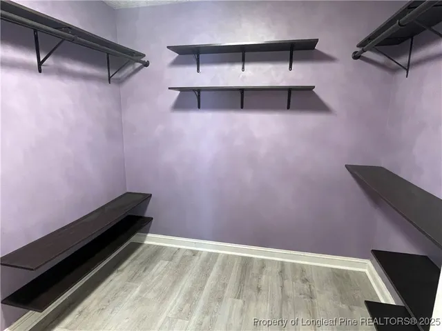 a view of room with cabinets