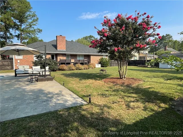 a house view with a sitting space and garden view