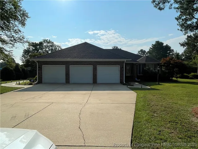 a house view with a garden space
