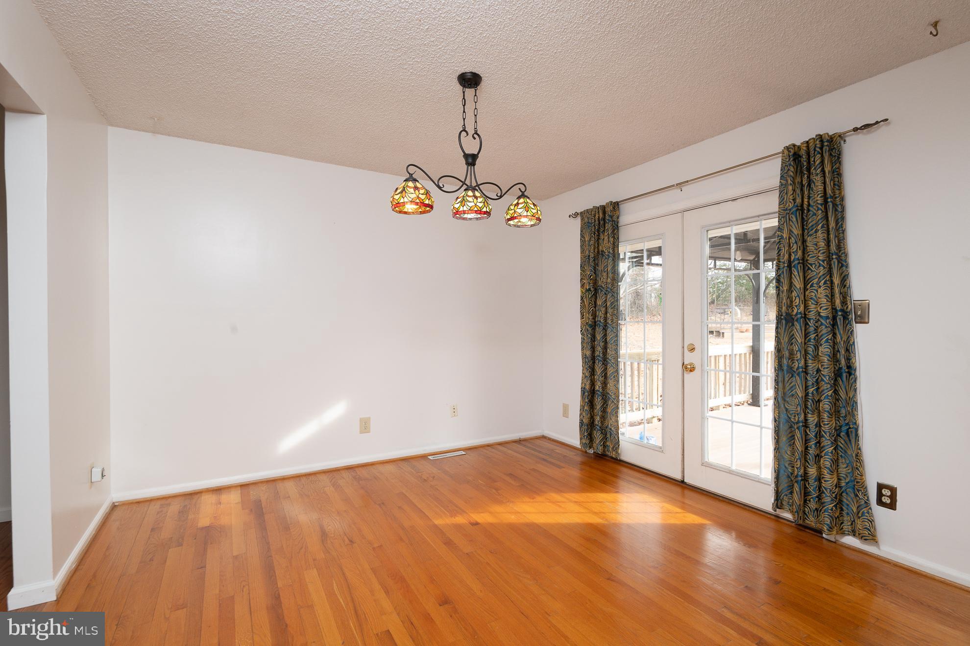 50 Olde Concord Road Stafford, VA 22554 - Photo 12 of 41 a view of a room with wooden floor and white walls