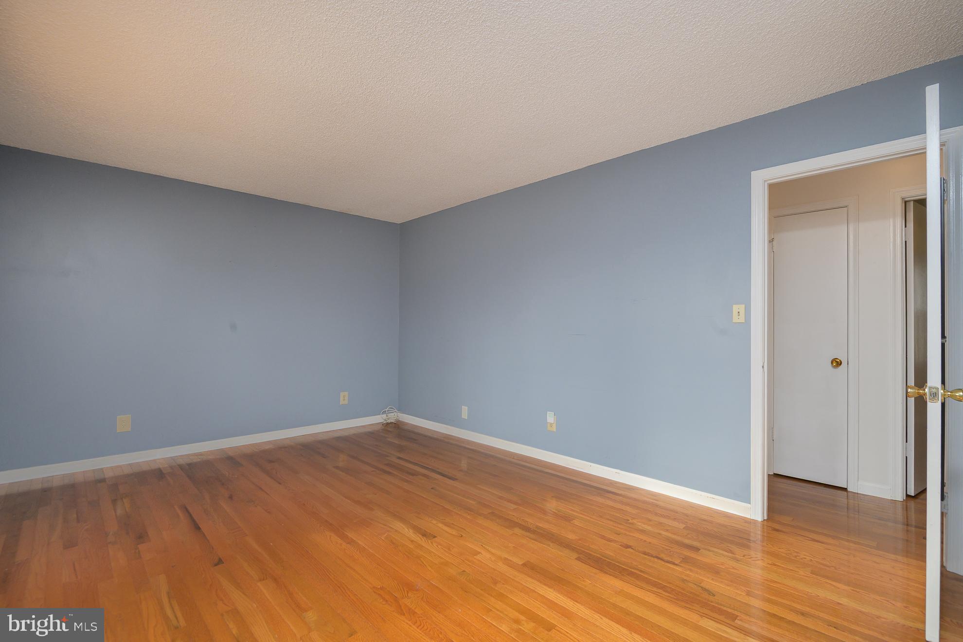 50 Olde Concord Road Stafford, VA 22554 - Photo 18 of 41 a view of an empty room with wooden floor