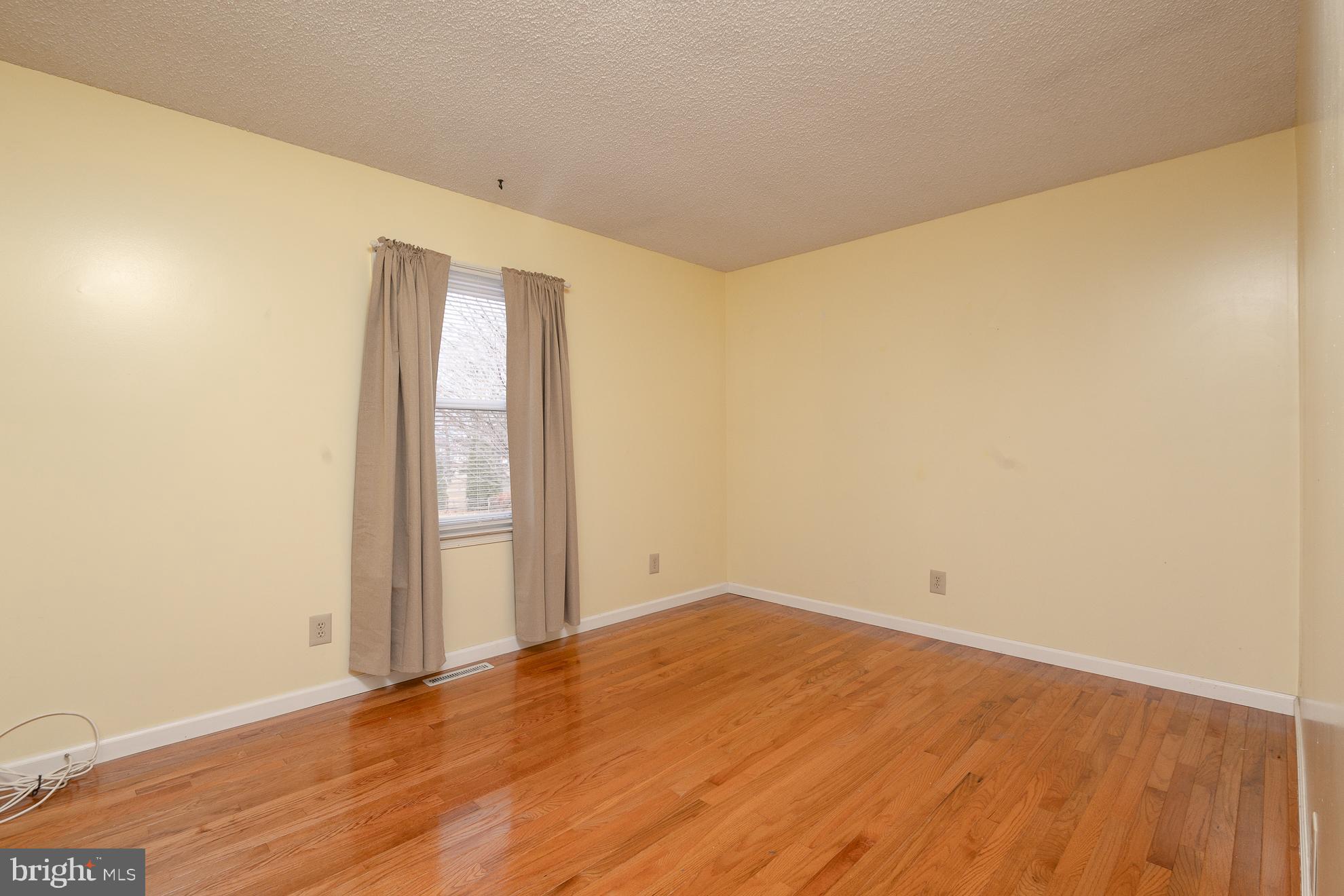 50 Olde Concord Road Stafford, VA 22554 - Photo 21 of 41 an empty room with wooden floor and windows