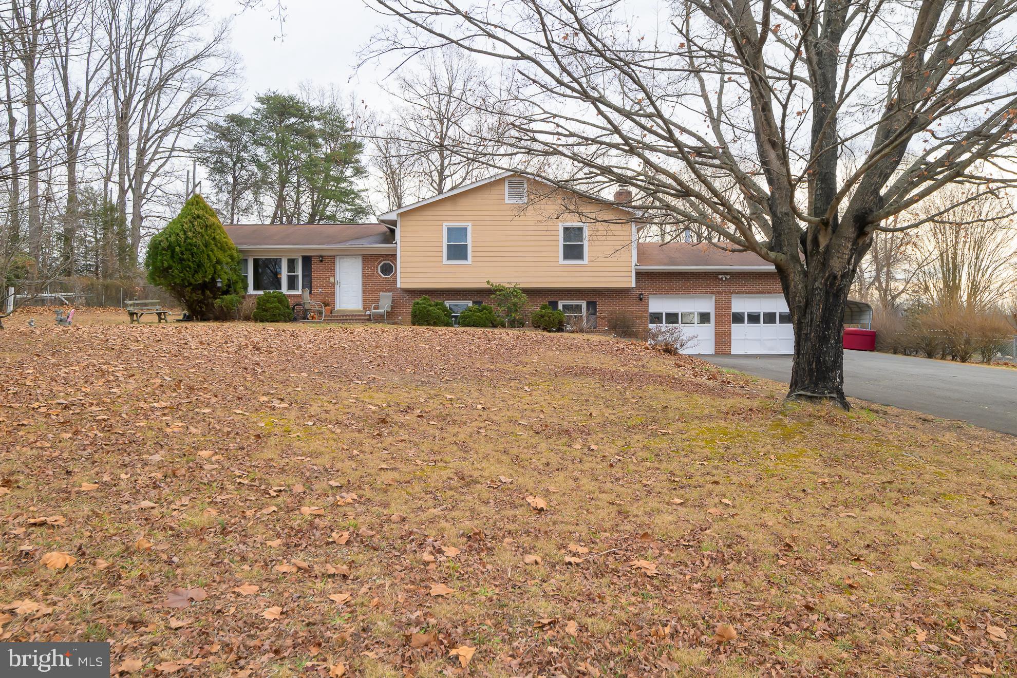 50 Olde Concord Road Stafford, VA 22554 - Photo 33 of 41 a front view of house with yard and trees