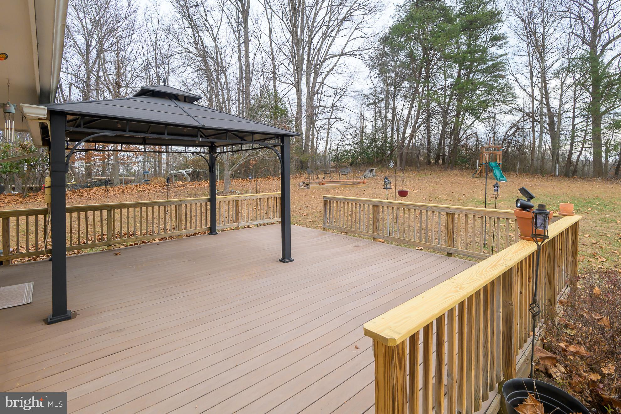 50 Olde Concord Road Stafford, VA 22554 - Photo 40 of 41 Spacious deck with serene backyard views.