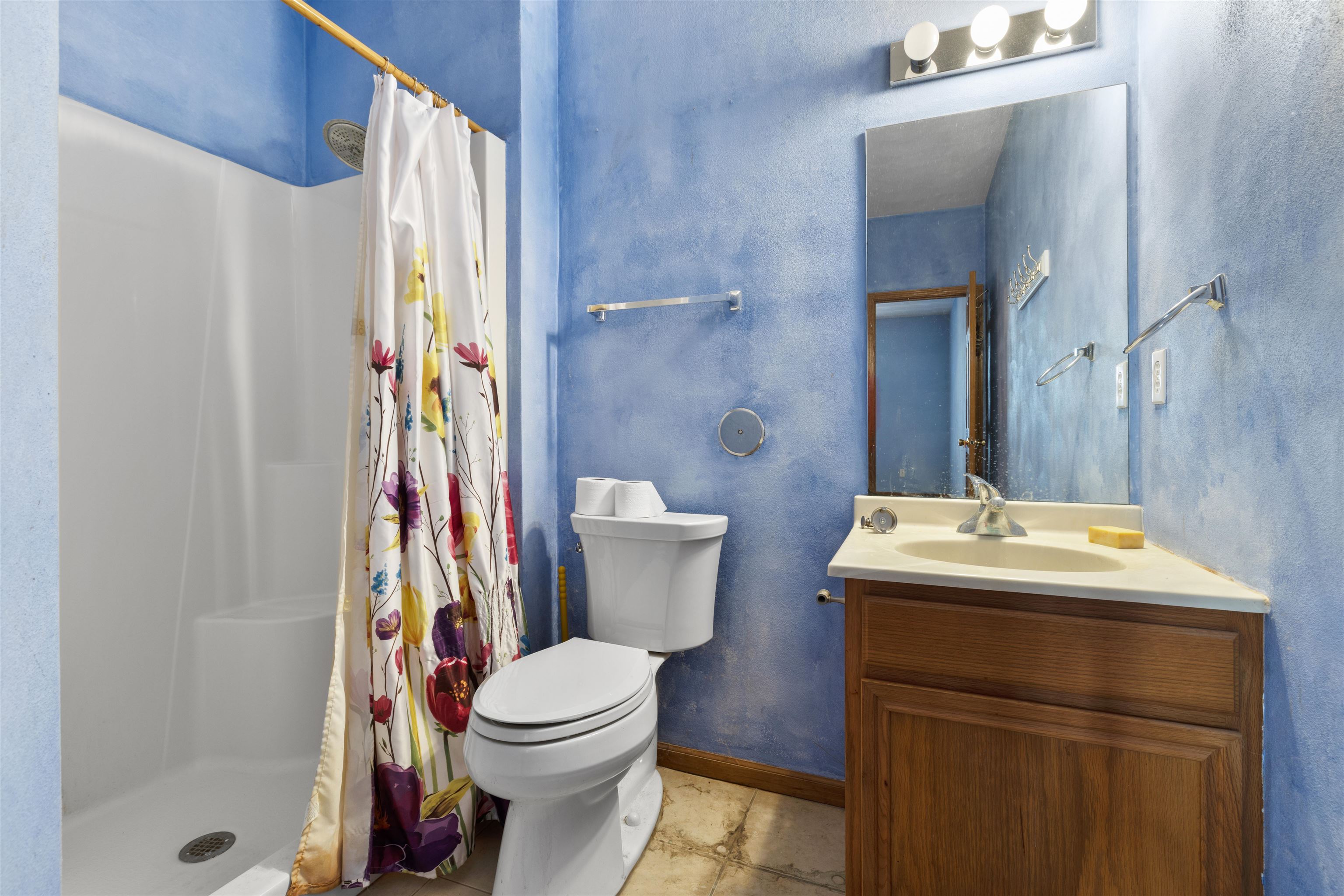 10149 Monarch Road, Unit 3 Roscoe, IL 61073 - Photo 11 of 13 a bathroom with a sink toilet and shower