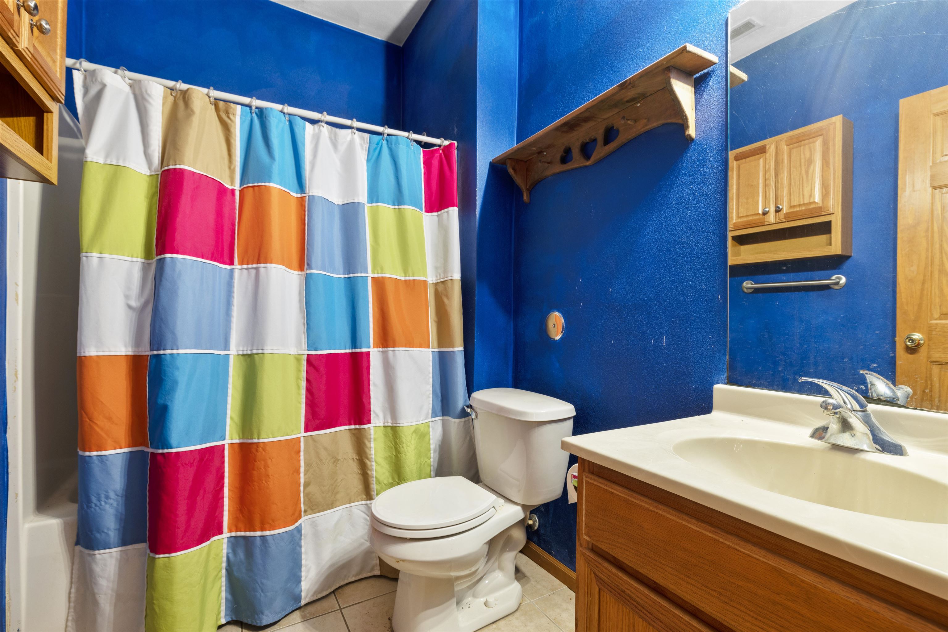 10149 Monarch Road, Unit 3 Roscoe, IL 61073 - Photo 13 of 13 a bathroom with a toilet and a sink