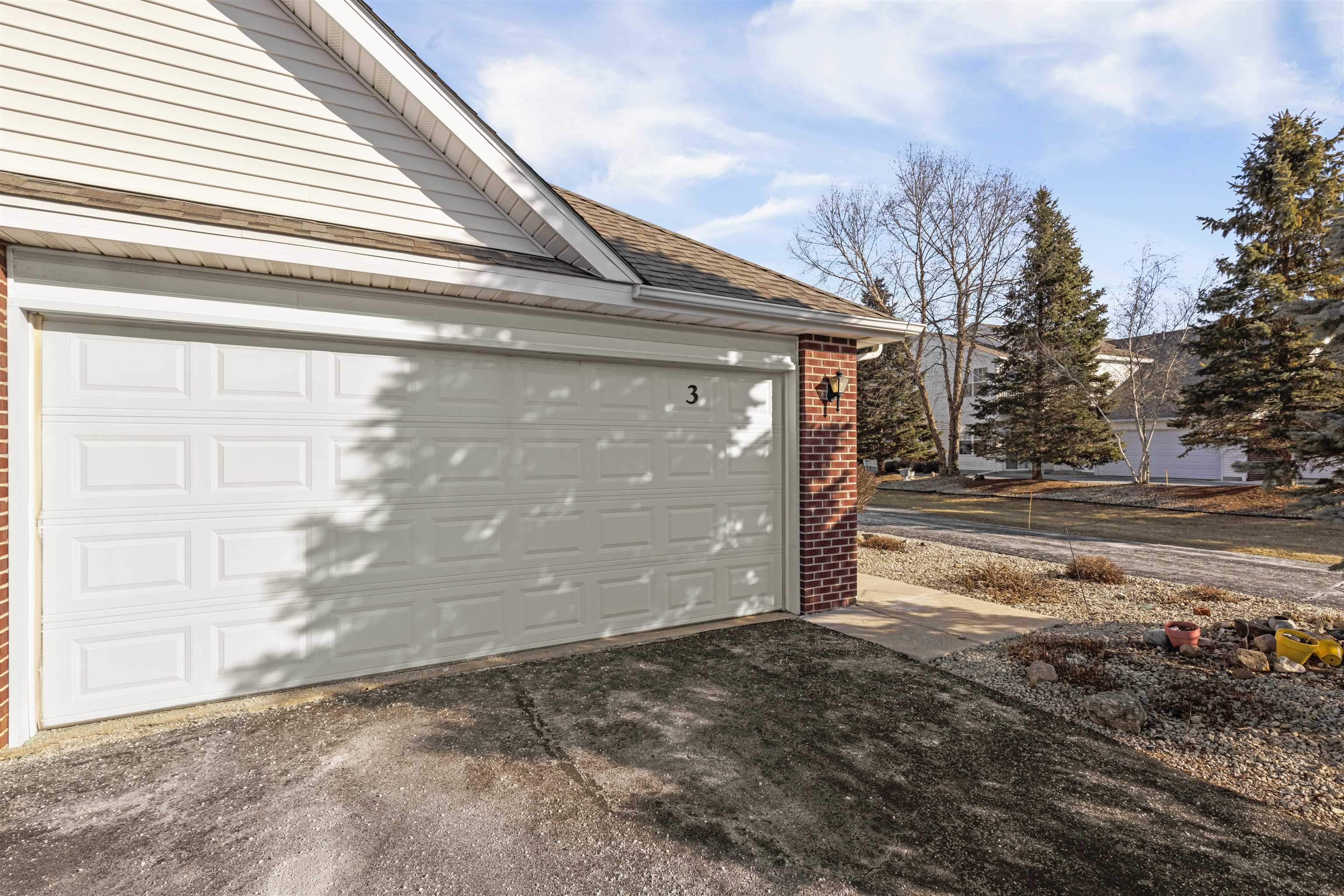 10149 Monarch Road, Unit 3 Roscoe, IL 61073 - Photo 2 of 13 a view of a house with a yard