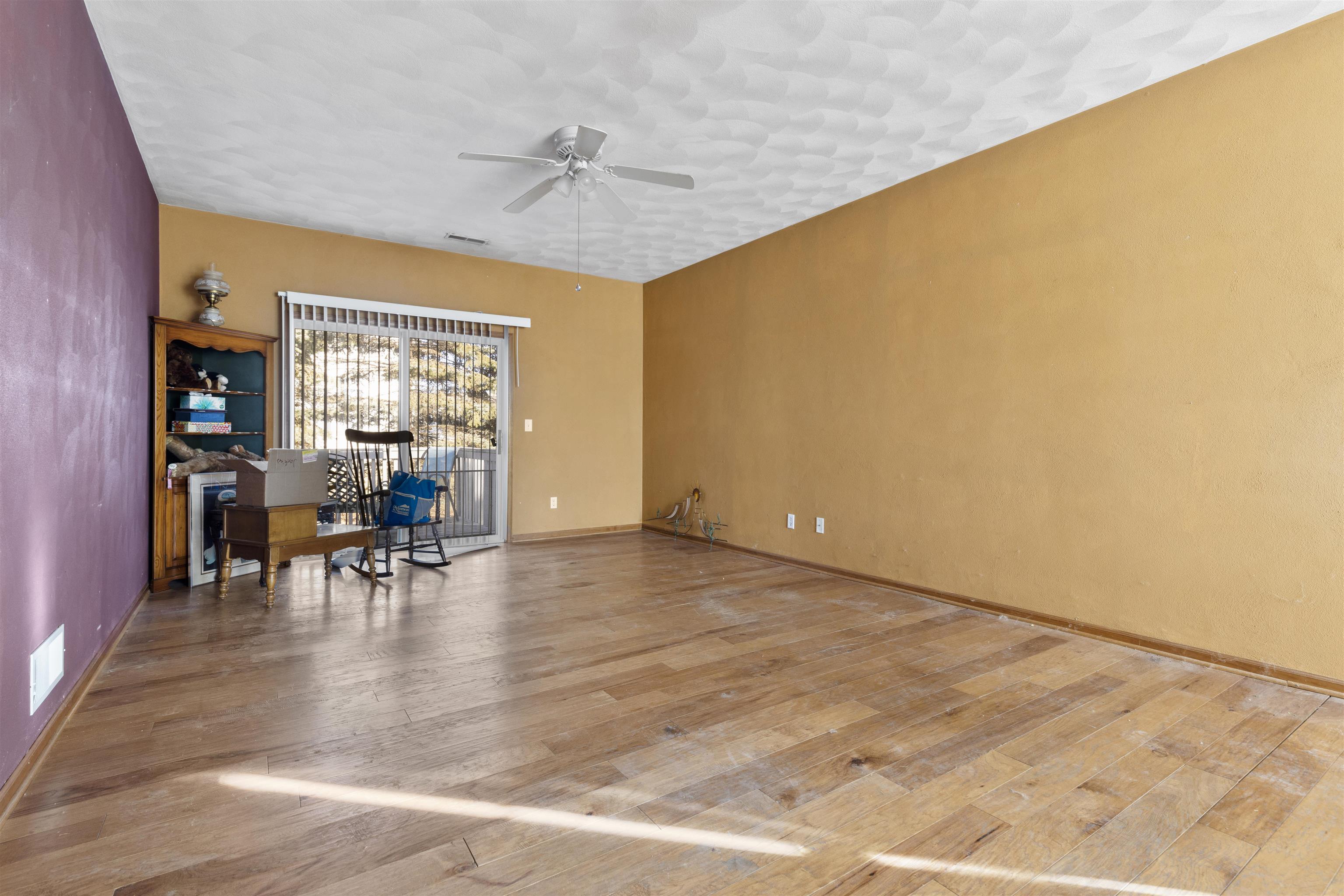 10149 Monarch Road, Unit 3 Roscoe, IL 61073 - Photo 4 of 13 a view of dining room with furniture and wooden floor