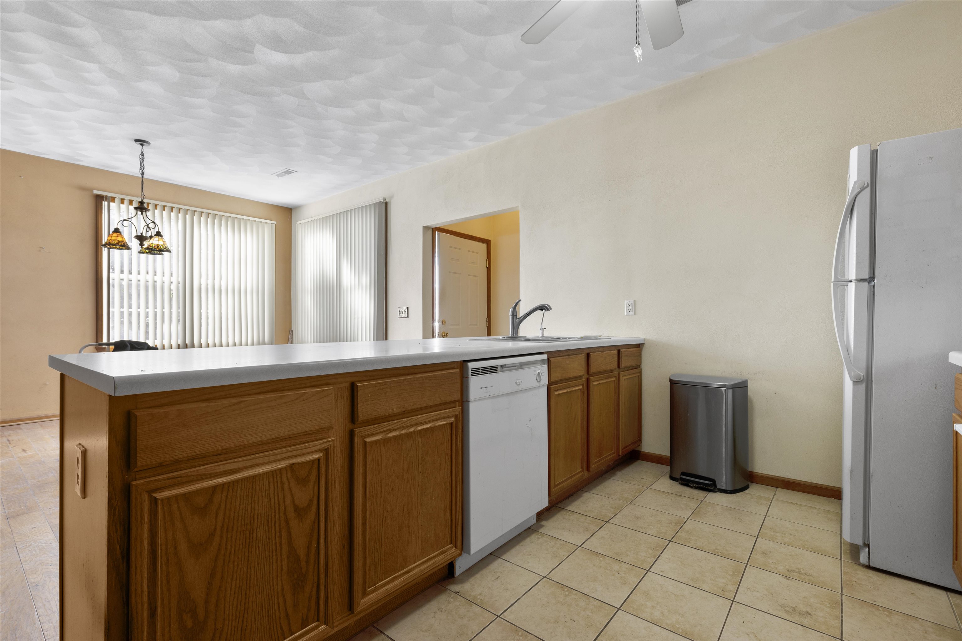 10149 Monarch Road, Unit 3 Roscoe, IL 61073 - Photo 5 of 13 a spacious bathroom with a double vanity sink a and a mirror