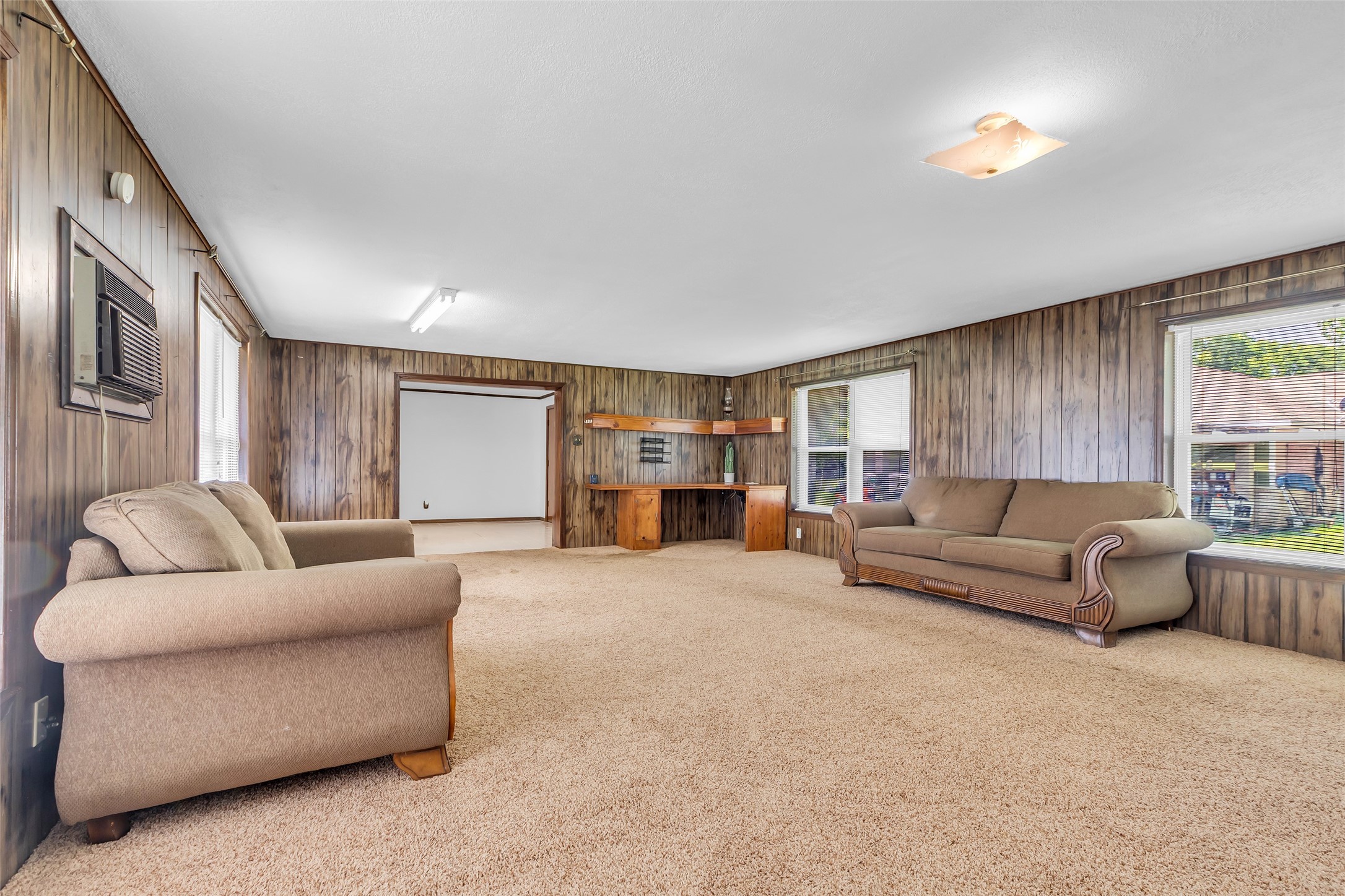 302 Channelview Drive Anahuac, TX 77514 - Photo 17 of 35 a living room with furniture and a window