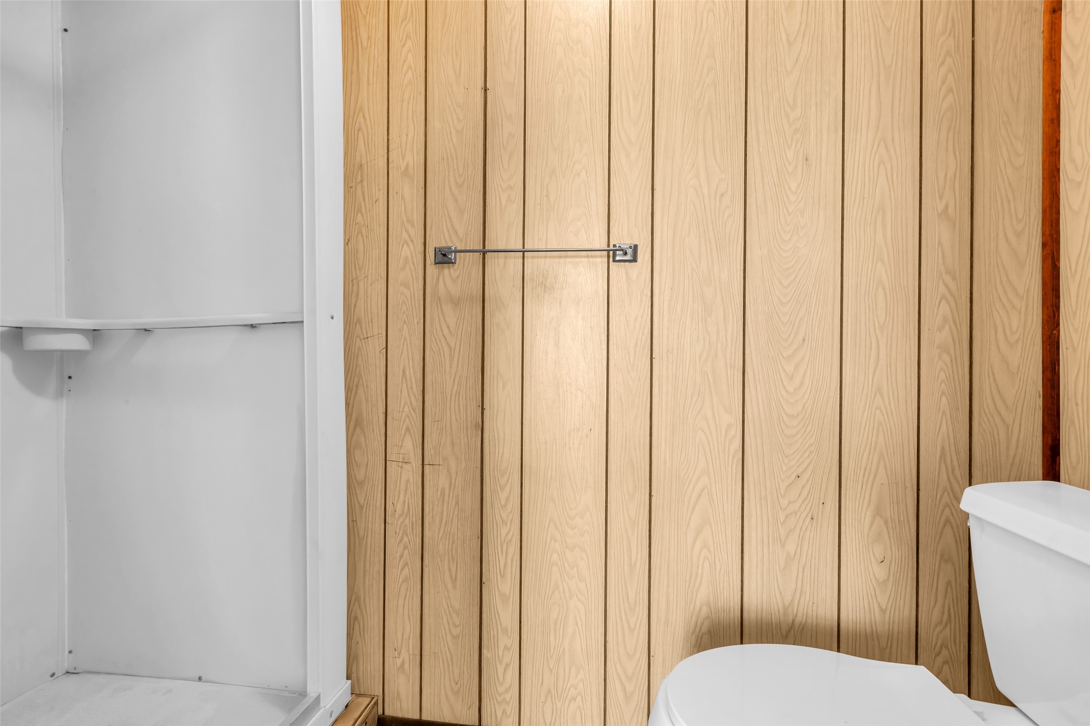 302 Channelview Drive Anahuac, TX 77514 - Photo 27 of 35 a white toilet sitting next to a shower