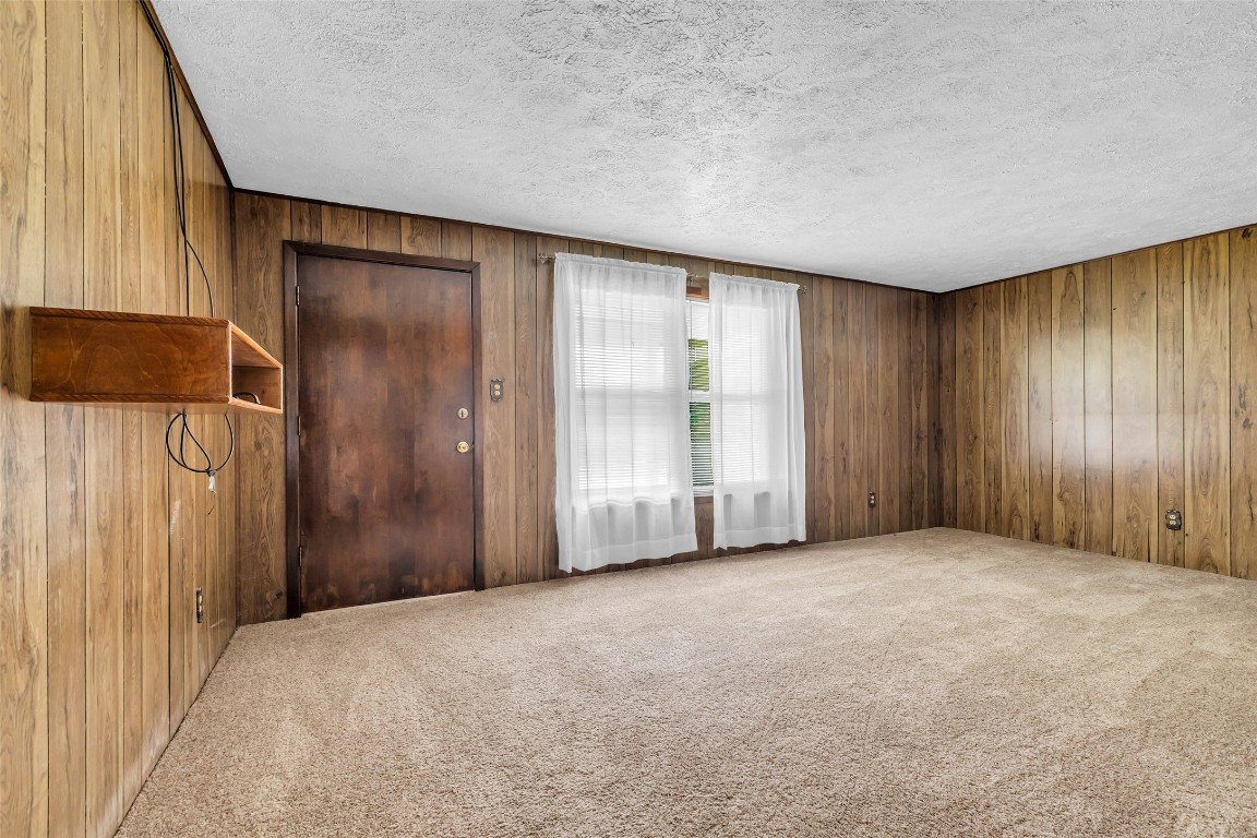 302 Channelview Drive Anahuac, TX 77514 - Photo 6 of 35 an empty room with windows