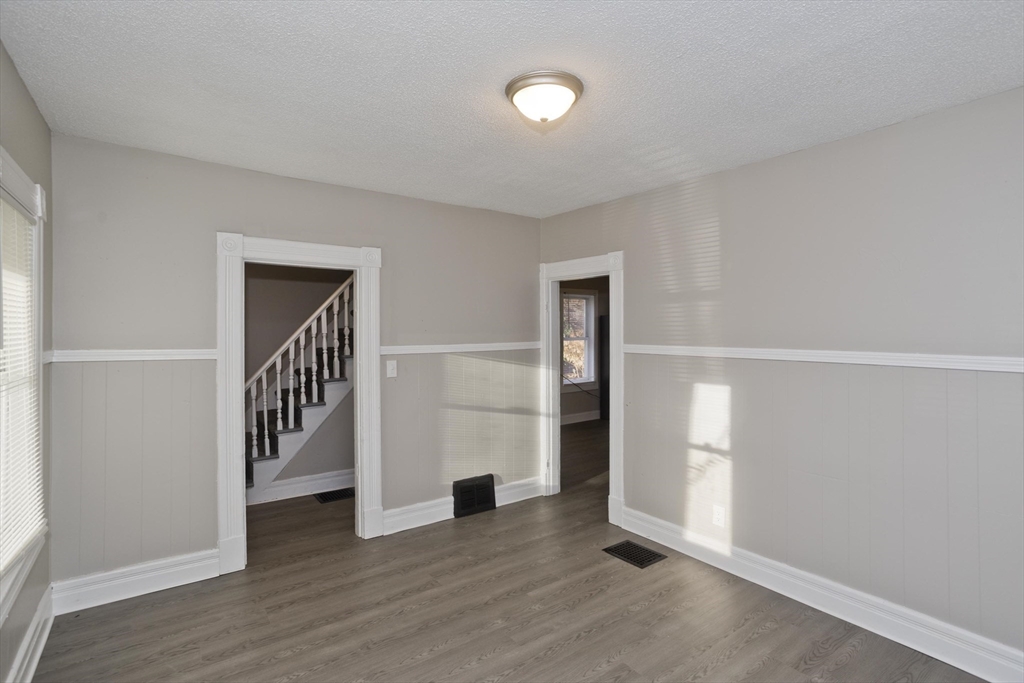 81 Hayden Avenue Springfield, MA 01109 - Photo 12 of 34 wooden floor in an empty room