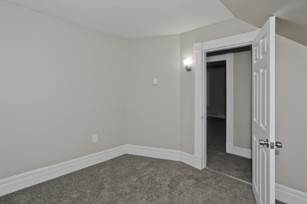 81 Hayden Avenue Springfield, MA 01109 - Photo 15 of 34 an empty room with closet