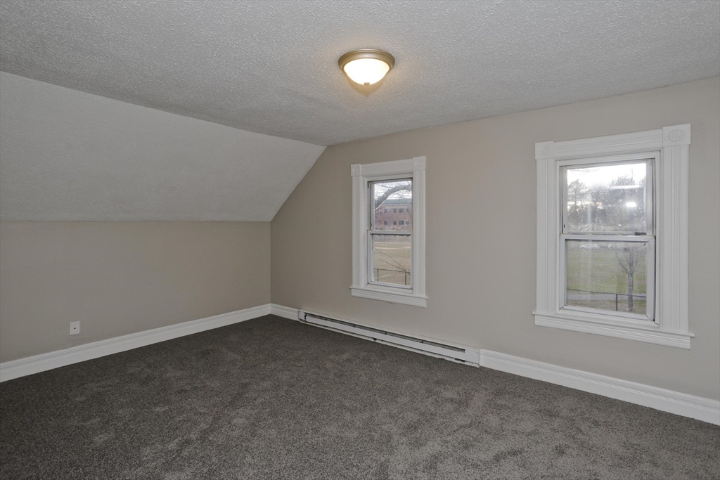 81 Hayden Avenue Springfield, MA 01109 - Photo 21 of 34 an empty room with windows