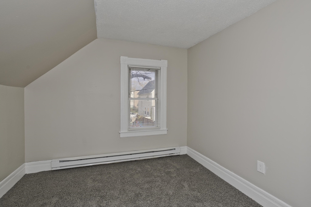 81 Hayden Avenue Springfield, MA 01109 - Photo 24 of 34 an empty room with a window