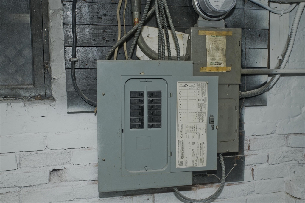 81 Hayden Avenue Springfield, MA 01109 - Photo 32 of 34 a front view of a house with parking