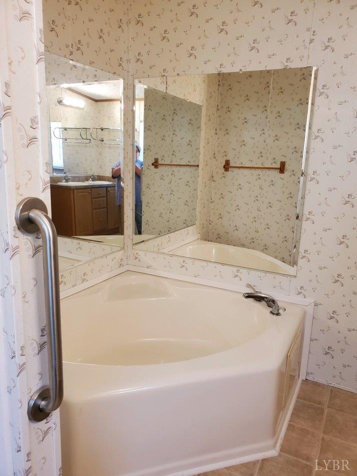 2075 New Bethel Road Meherrin, VA 23954 - Photo 15 of 32 a bathroom with a bathtub