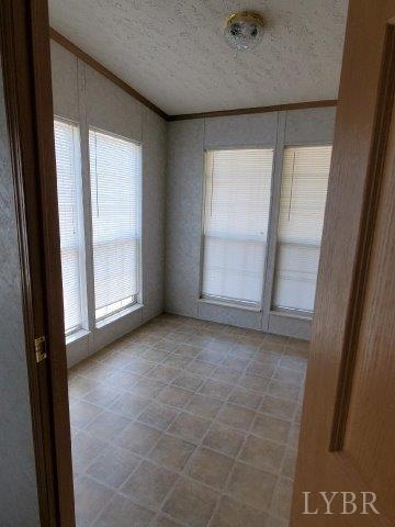 2075 New Bethel Road Meherrin, VA 23954 - Photo 17 of 32 a view of an empty room with a window