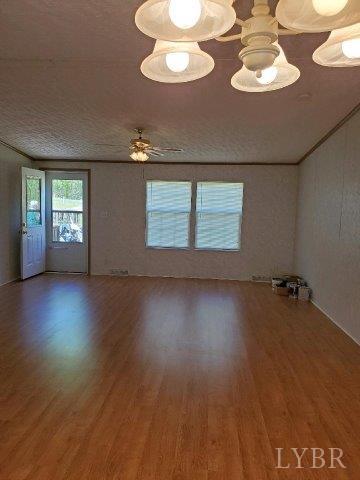 2075 New Bethel Road Meherrin, VA 23954 - Photo 2 of 32 a view of a livingroom with furniture and a floor to ceiling window