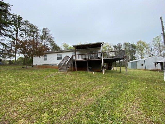 2075 New Bethel Road Meherrin, VA 23954 - Photo 23 of 32 a view of a house with a backyard
