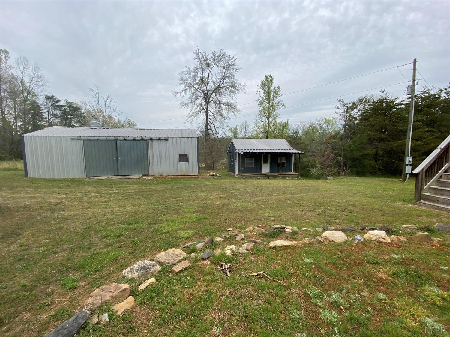 2075 New Bethel Road Meherrin, VA 23954 - Photo 26 of 32 a view of a house with a yard