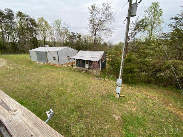 2075 New Bethel Road Meherrin, VA 23954 - Photo 27 of 32 a view of a house with a yard