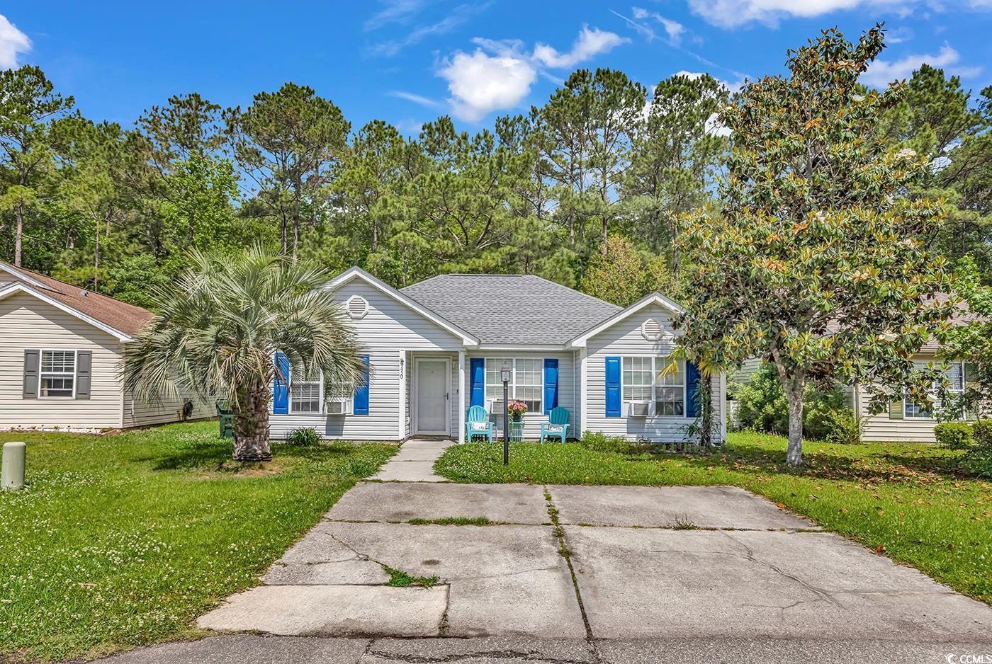 9450 Leeds Circle Myrtle Beach, SC 29588 - Photo 1 of 25 View of front of property featuring a front yard