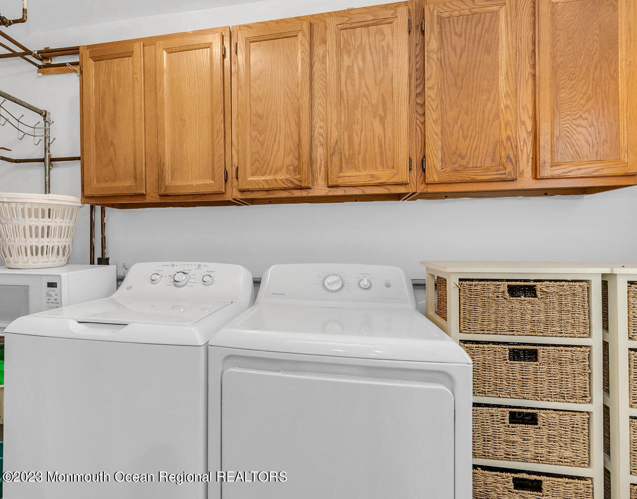 1812 Beverly Avenue Spring Lake Heights, NJ 07762 - Photo 14 of 18 a utility room with dryer and washer