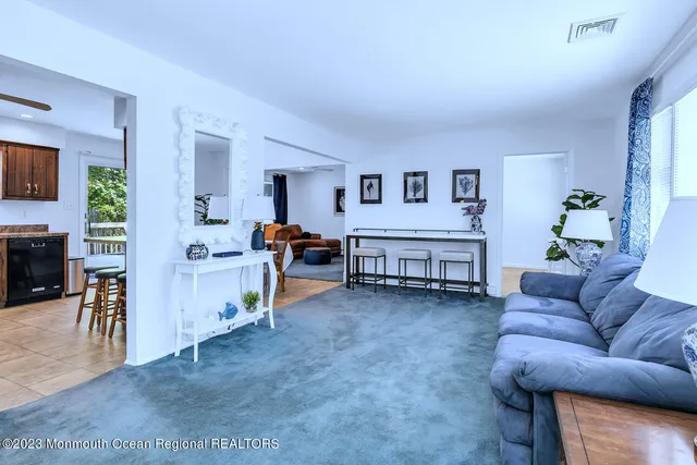 a living room with furniture and a couch