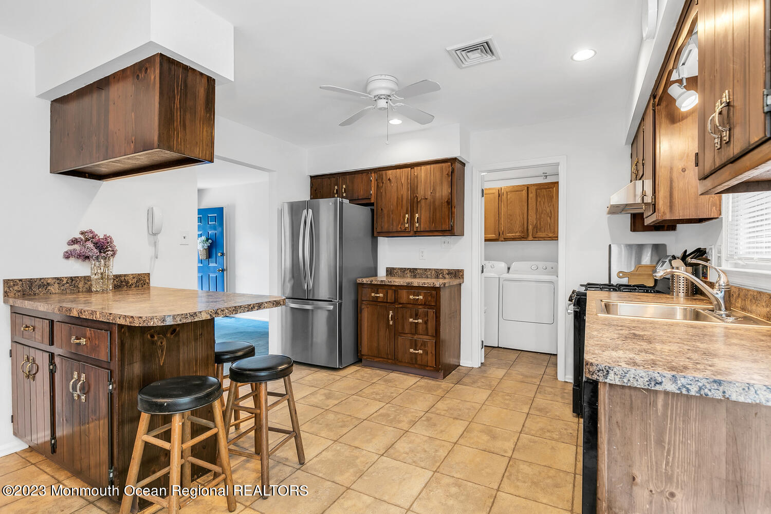1812 Beverly Avenue Spring Lake Heights, NJ 07762 - Photo 5 of 18 a kitchen with stainless steel appliances granite countertop a refrigerator and a stove top oven