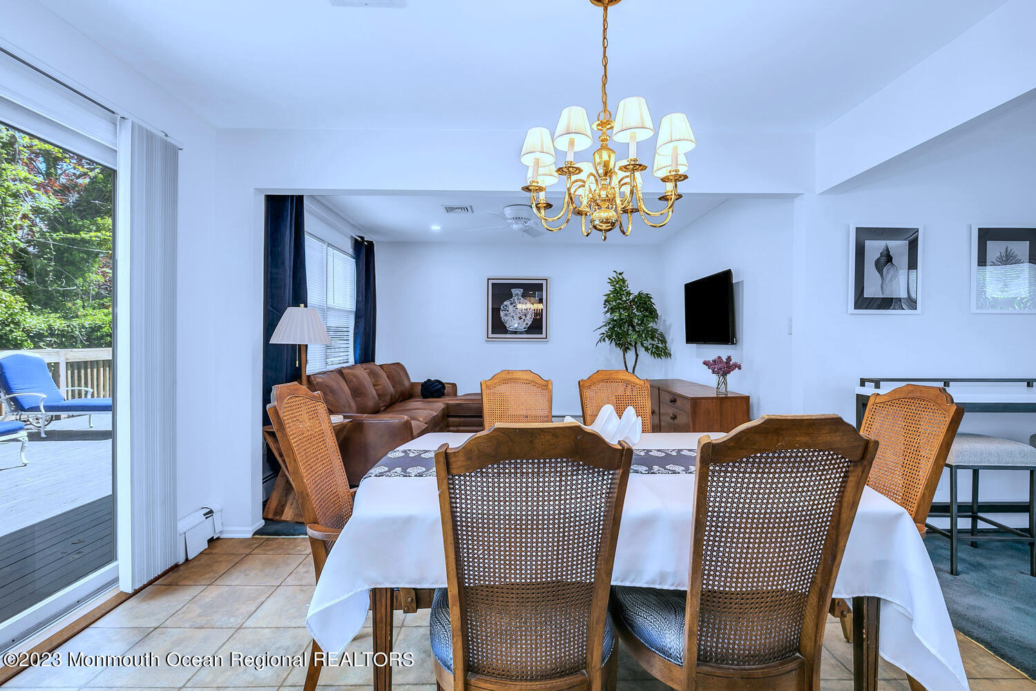 1812 Beverly Avenue Spring Lake Heights, NJ 07762 - Photo 7 of 18 a view of a dining room with furniture and chandelier