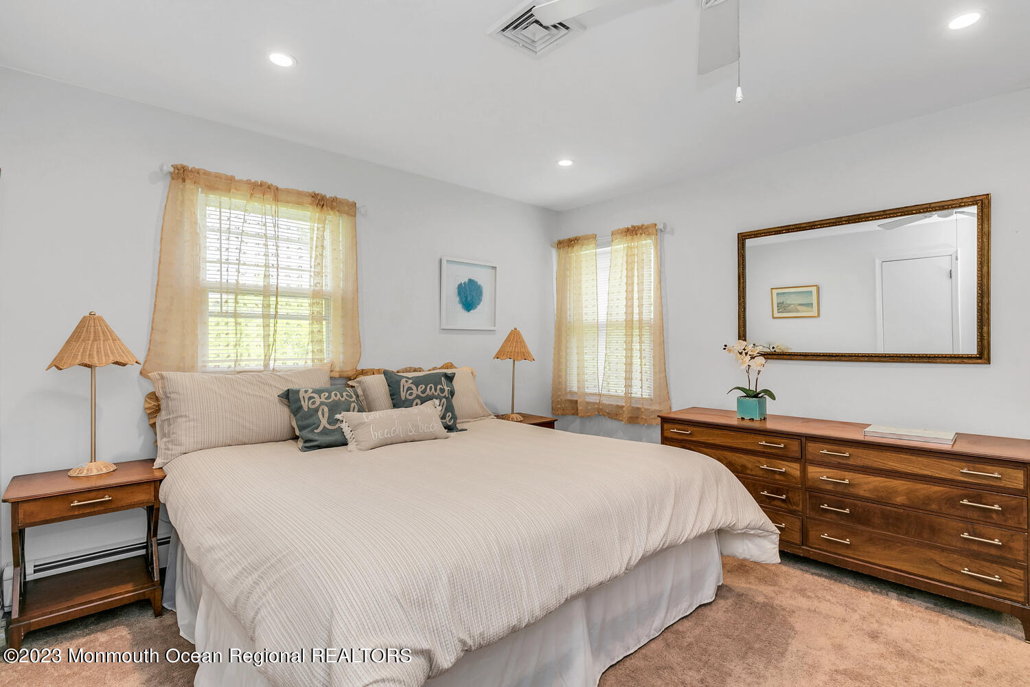 1812 Beverly Avenue Spring Lake Heights, NJ 07762 - Photo 8 of 18 a bedroom with a bed and a dresser