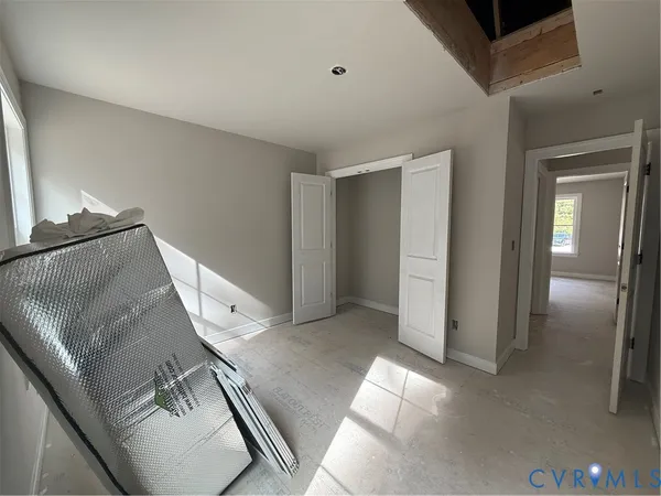 a view of a living room with entryway