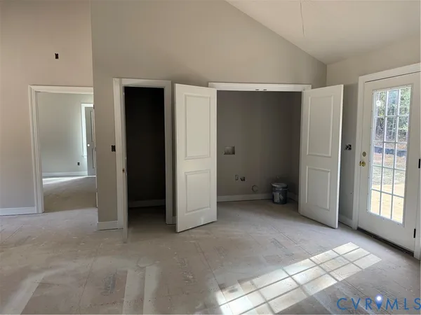 a view of an empty room with a window