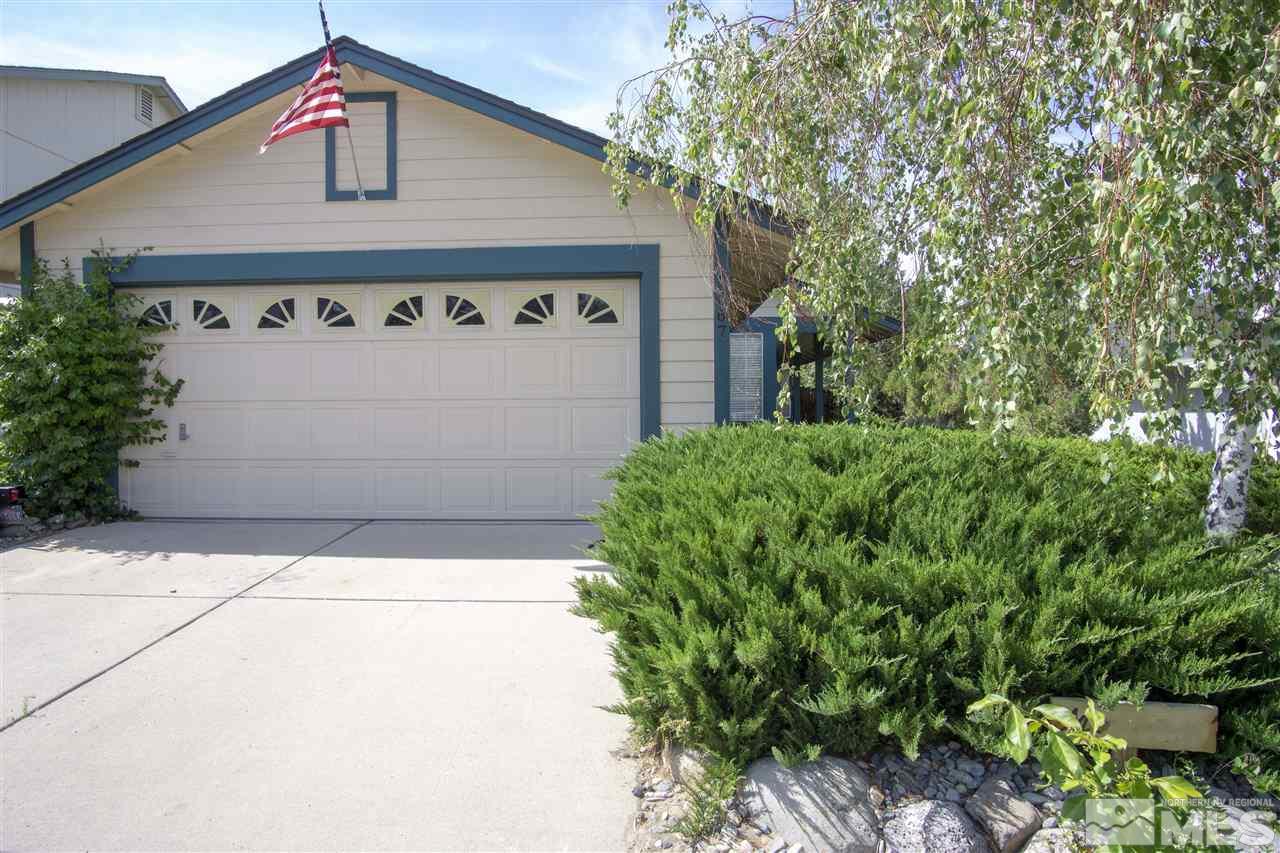 1067 Embassy Way Reno, NV 89523 - Photo 1 of 18 a front view of a house with plants