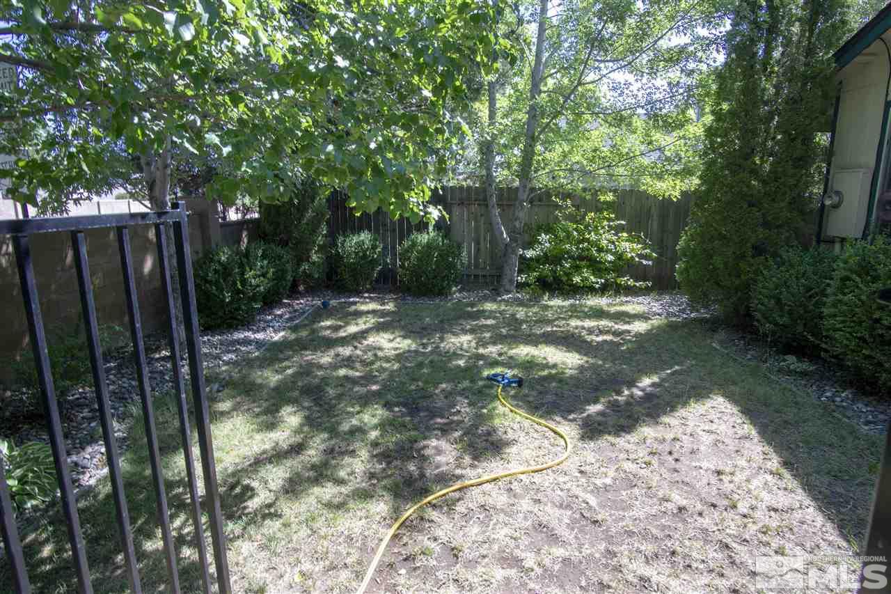 1067 Embassy Way Reno, NV 89523 - Photo 17 of 18 a view of backyard with tree