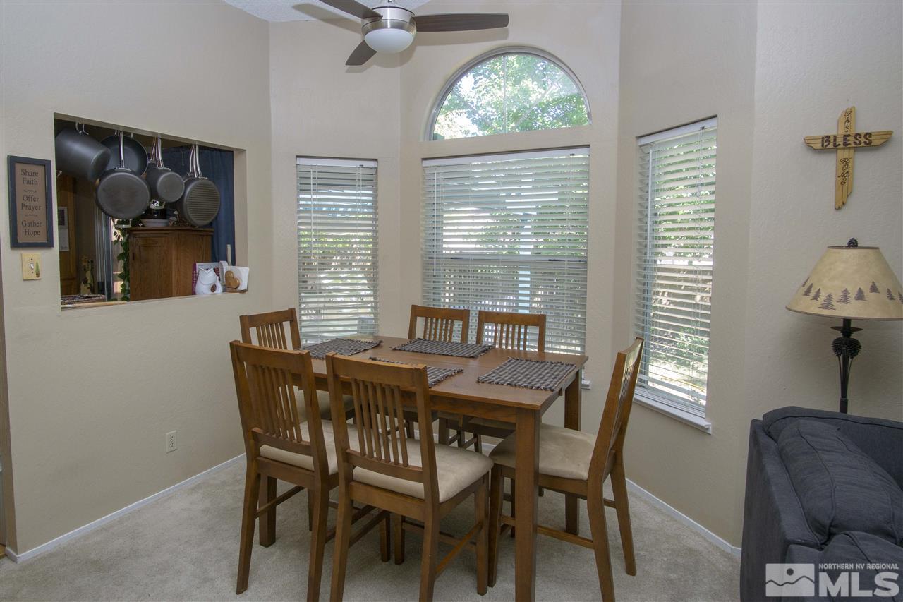 1067 Embassy Way Reno, NV 89523 - Photo 7 of 18 a dining room with furniture and window